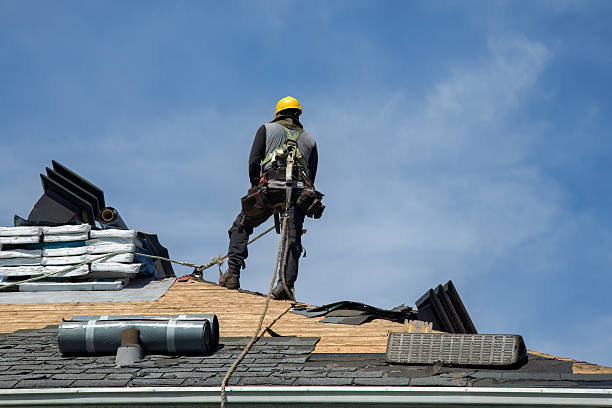 Professional Roofing technician working in East Rockaway, NY